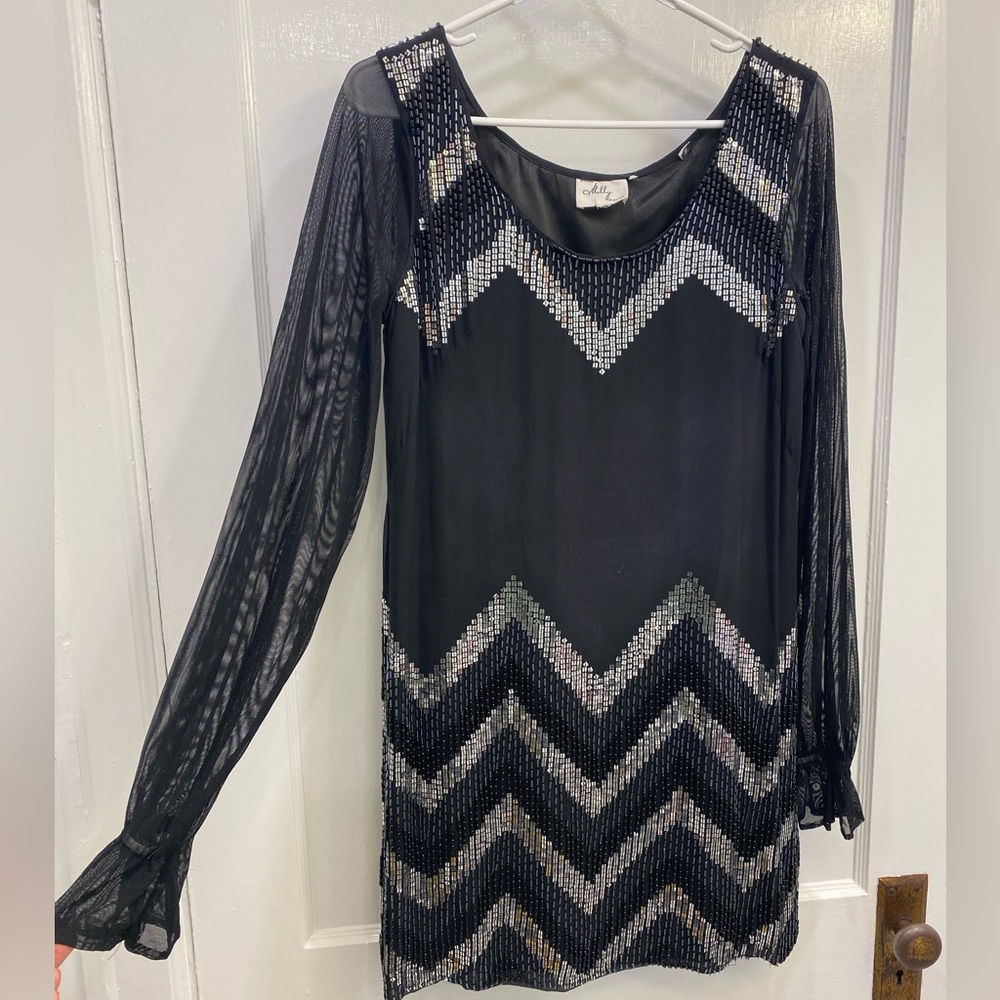 Milly of a new York black and silver sequence cocktail dress